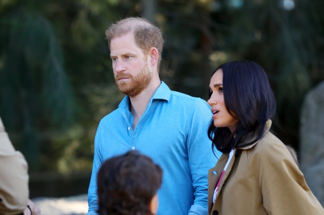 Prince Harry (3-L) and Meghan (2-R), the Duke and Duchess of Sussex, participate in the Scar Tree Walk at Birrarung Marr in Melbourne, Australia, 16 April 2026.