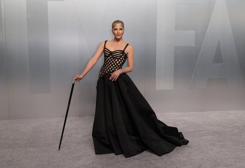 Selma Blair has turned her cane into a fashion statement. Pictured here at the Vanity Fair Oscars party in Beverly Hills, California, in March 2026.