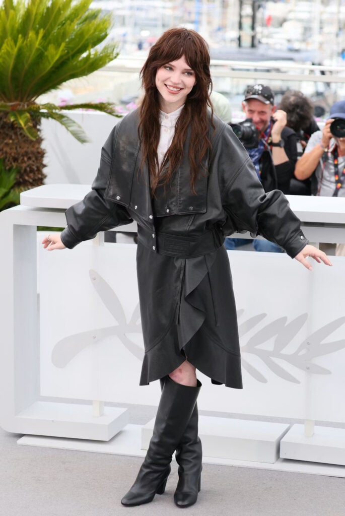 Sophie Thatcher wore an all-black Louis Vuitton look with Alvon boots to the Cannes Film Festival photocall.