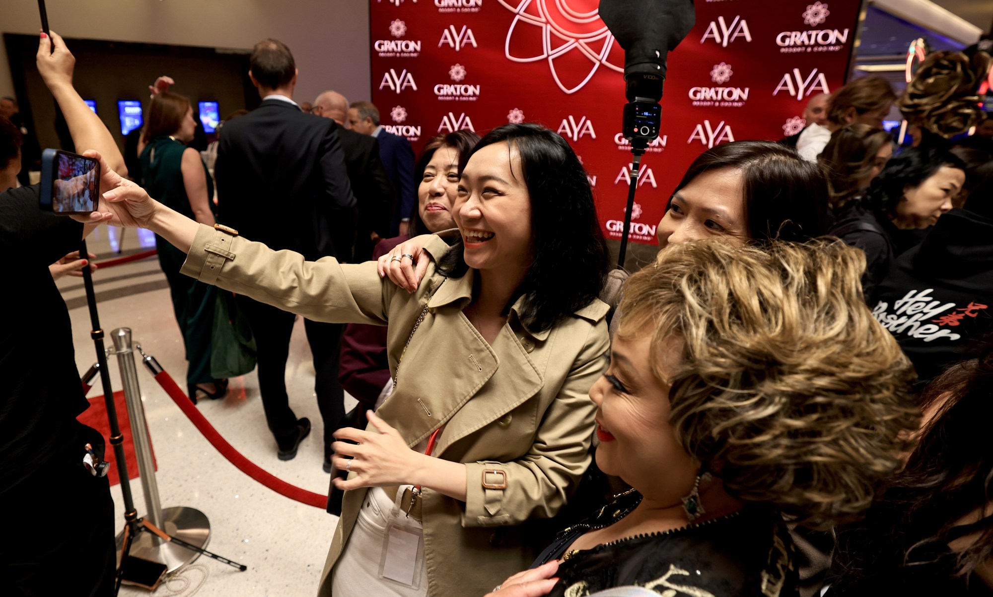 Hey Brother fans make a selfie on the red carpet at the grand opening of Graton Resort and Casino's rooftop restaurant, AYA, Thursday, May 7, 2026, near Rohnert Park. (Kent Porter / The Press Democrat)