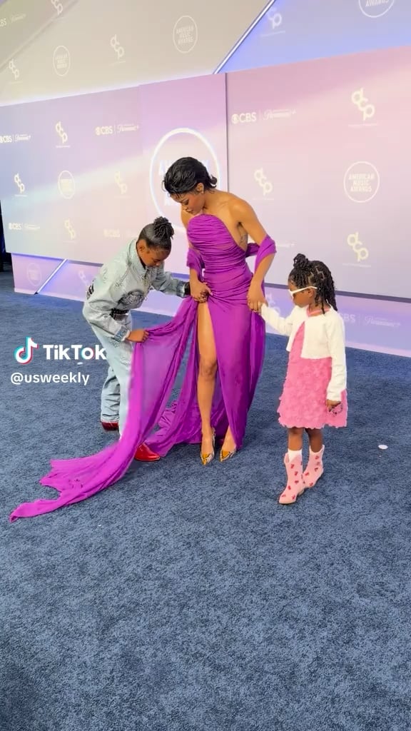 Teyana Taylor had the cutest plus-ones on the AMAs red carpet - her daughters, Junie, 10, and Rue Rose, 5 (May 25, 2026)