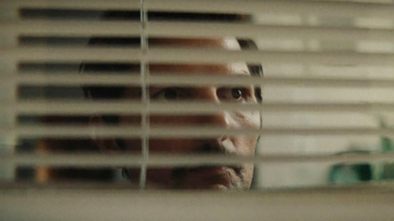 Adam Scott as Sean Harrison creeping in The Saviors
