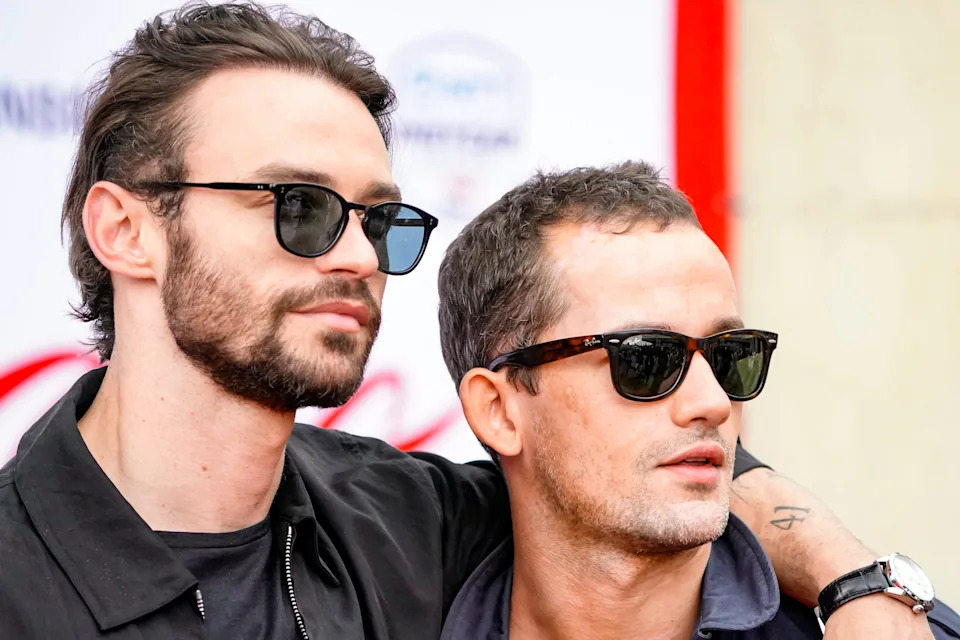Thomas Doherty, left, and Eli Brown, walk the celebrity red carpet on Sunday, May 24, 2026, during the 110th running of the Indianapolis 500 at Indianapolis Motor Speedway.