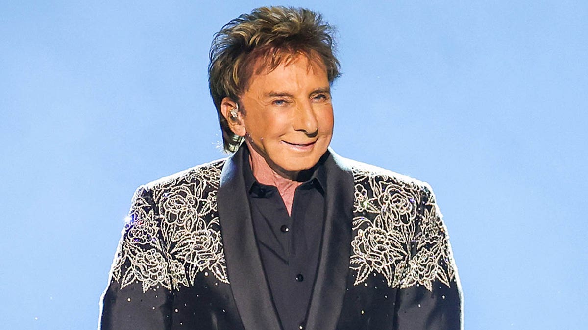 Singer Barry Manilow performing onstage at Climate Pledge Arena in Seattle