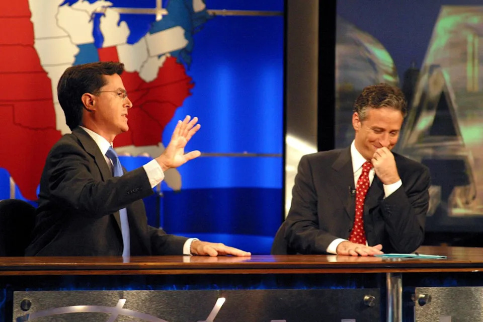 Colbert and Stewart on 'The Daily Show' in 2004Credit: Comedy Central