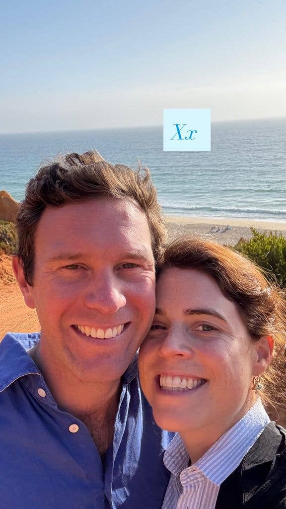 Jack Brooksbank and Princess Eugenie smiling at a beach