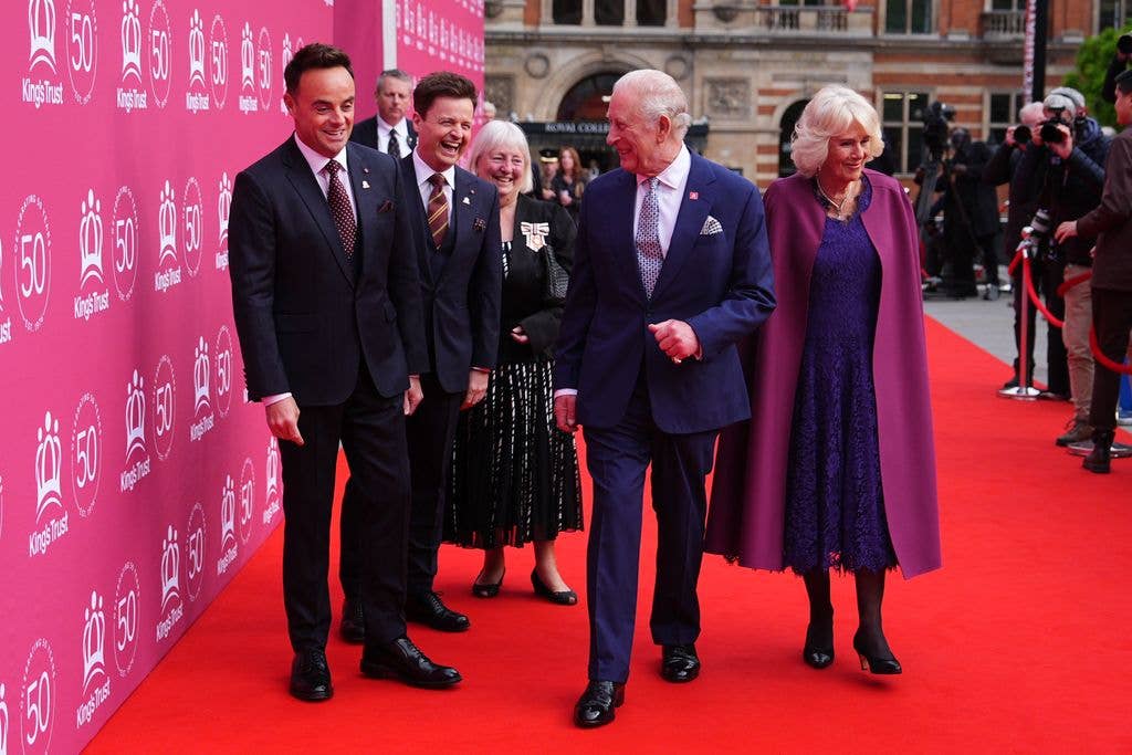 King Charles III and Queen Camilla laugh with Ant McPartlin and Declan Donnelly, aka Ant and Dec