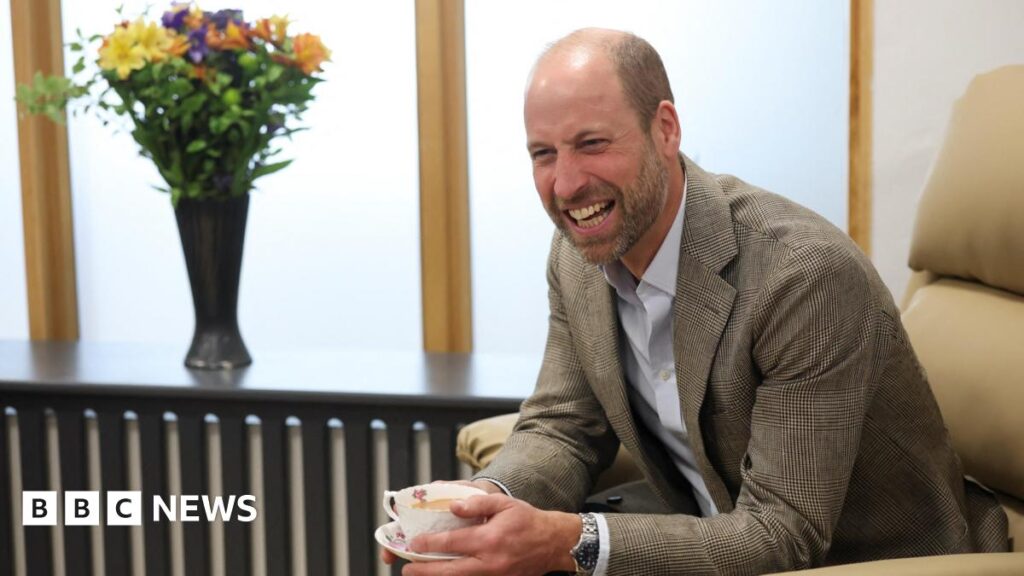 Britain's Prince William, The Duke of Cornwall, reacts as he speaks with care home residents during his visit to the Isles of Scilly Hospital on the day he officially opens a new facility there, in St Mary's, Isles of Scilly, Britain, May 22, 2026.