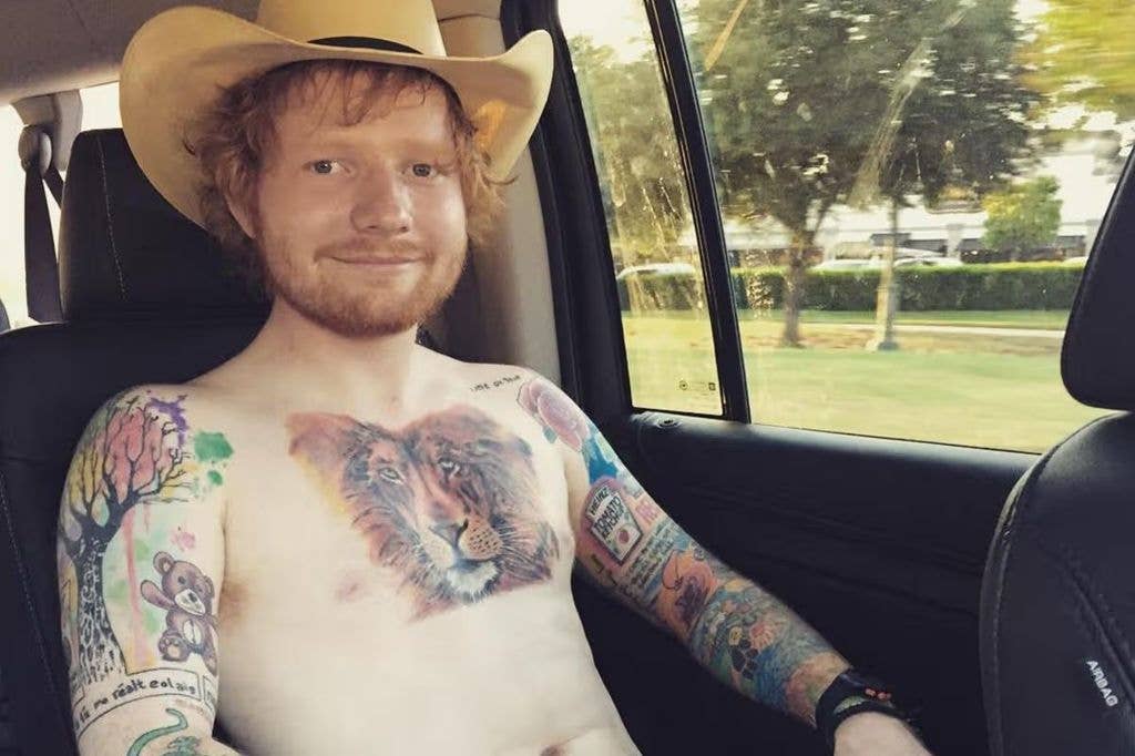photo of ed sheeran lion tattoo on chest