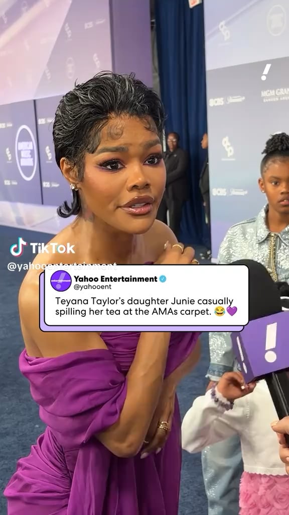 Teyana Taylor's daughter Junie casually spilling her tea at the AMAs carpet.