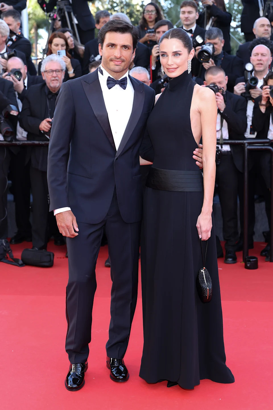 CANNES, FRANCE - MAY 12: Carlos Sainz Jr. and Rebecca Donaldson attend the opening ceremony and "La Vénus Electrique" (The Electric Venus) screening during the 79th annual Cannes Film Festival at Palais des Festivals on May 12, 2026 in Cannes, France. (Photo by Pascal Le Segretain/Getty Images)