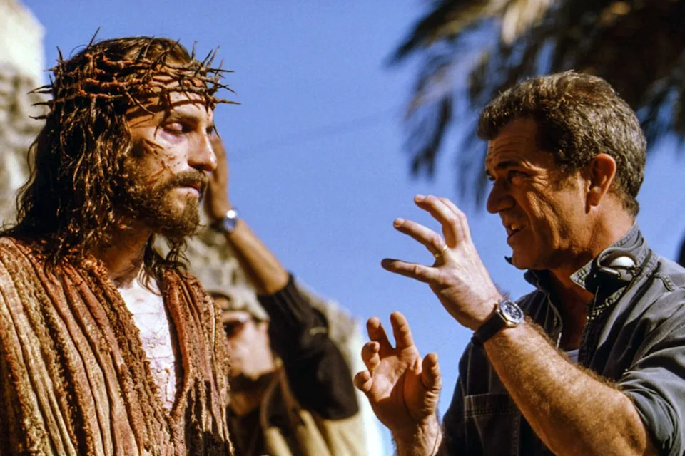 Jim Caviezel and Mel Gibson on 'The Passion of the Christ' setCredit: Newmarket/ Everett