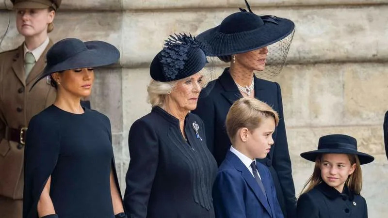Meghan Markle, Queen Camilla, Prince George, Kate Middleton and Princess Charlotte attend Queen Elizabeth II’s funeral in 2022. By: MEGA