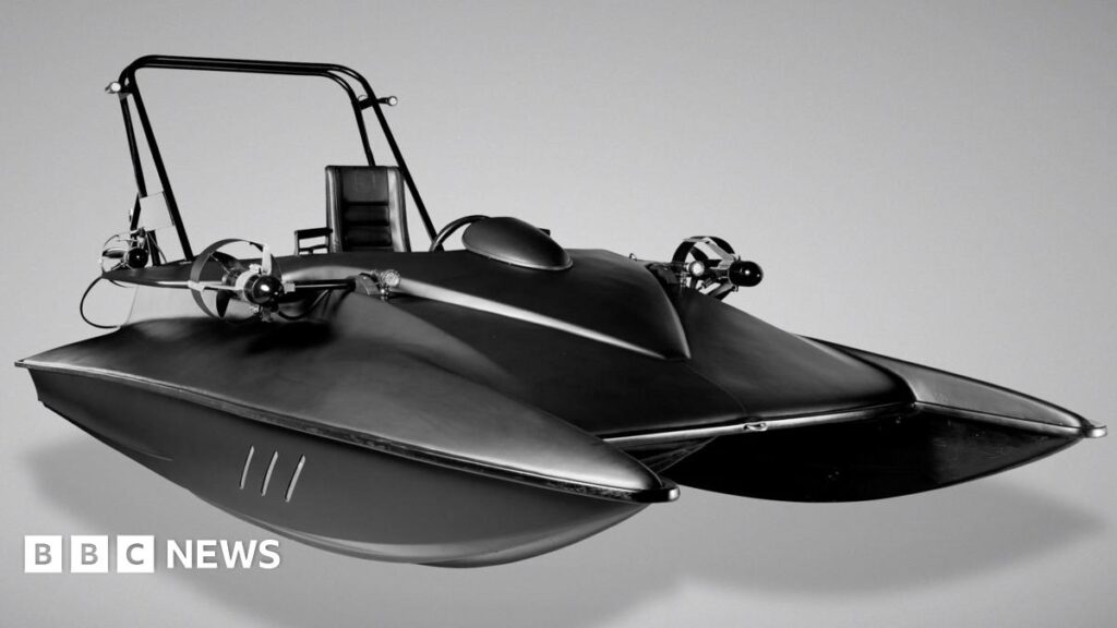 A black speed boat-like vessel.