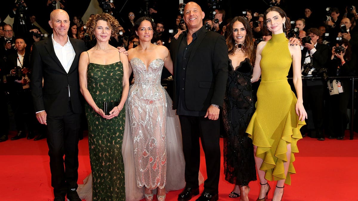 Neal H. Moritz, Dame Donna Langley, Michelle Rodriguez, Vin Diesel, Jordana Brewster and Meadow Walker standing together at Cannes Film Festival