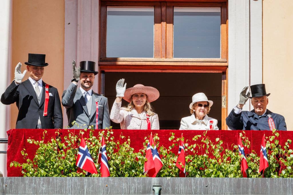 Prince Sverre Magnus, Crown Prince Haakon, Crown Princess Mette Marit, Queen Sonja and King Harald of Norway waved from the balcony