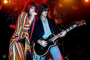 NEW YORK - DECEMBER 03: Steven Tyler and Joe Perry of American rock band Aerosmith perform on stage at Madison Square Garden on December 3rd 1975 in New York. (Photo by Richard E. Aaron/Redferns)