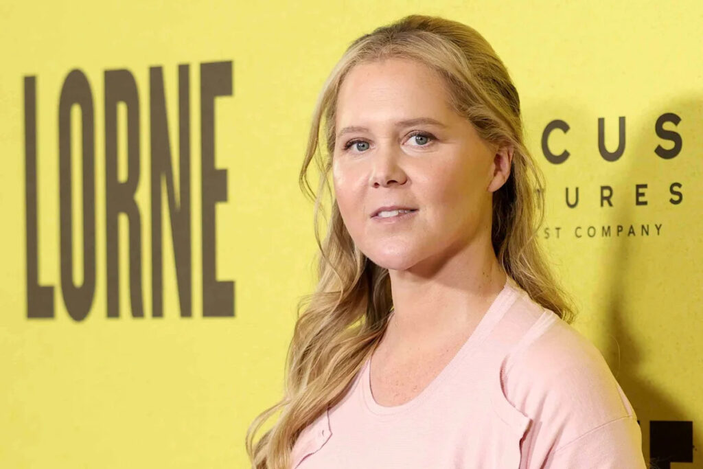 Amy Schumer Wows in Red-Hot Swimsuit While Jet Skiing With Son Gene, 7, During Yacht Getaway Mom of triplets says she