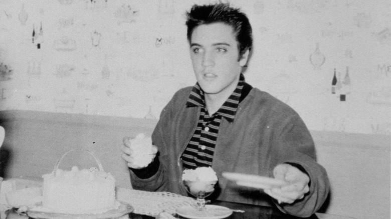 Elvis Presley eating ice cream