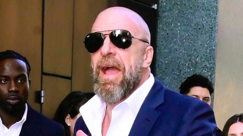 Triple H trying to say something