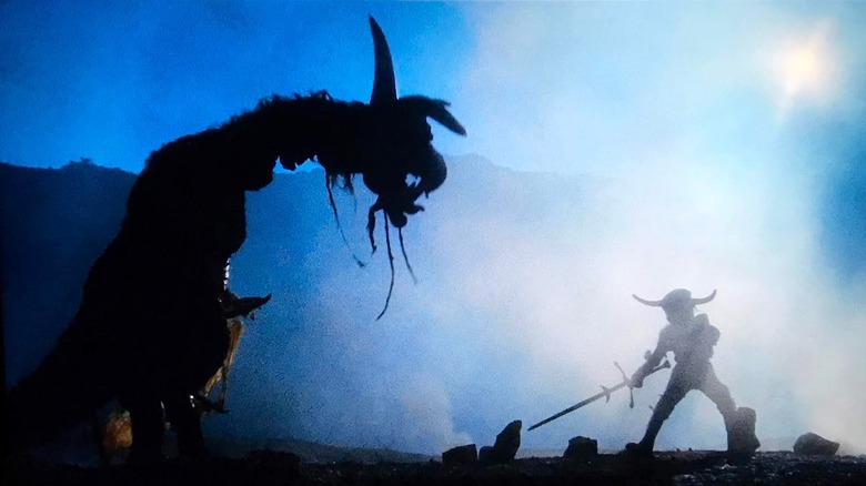 the Jabberwocky beast facing down David Prowse as the Black Knight in Jabberwocky