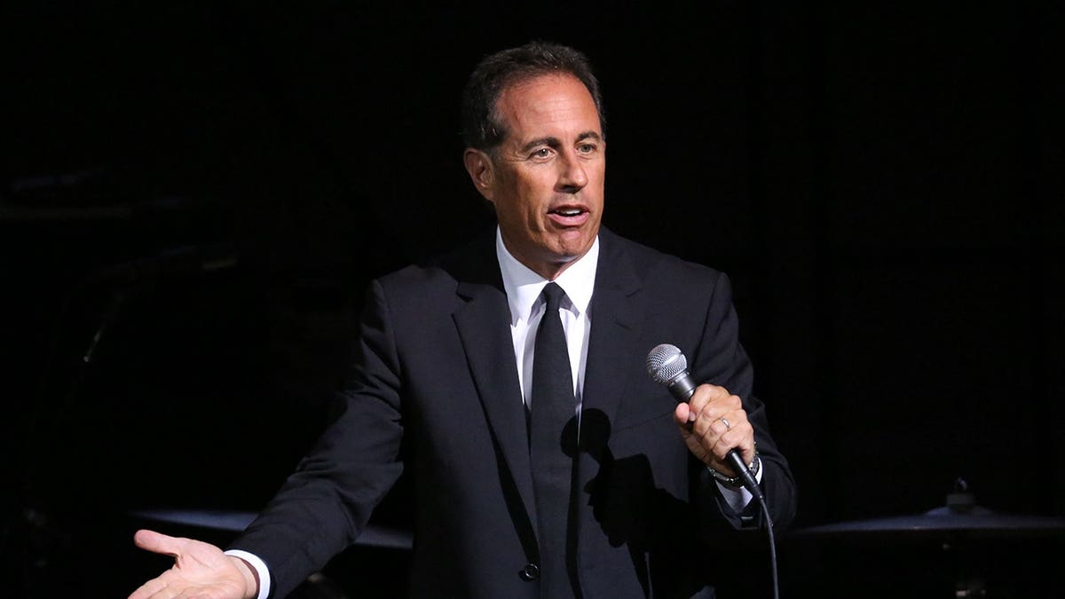 Jerry Seinfeld performing on stage at Carnegie Hall in New York City