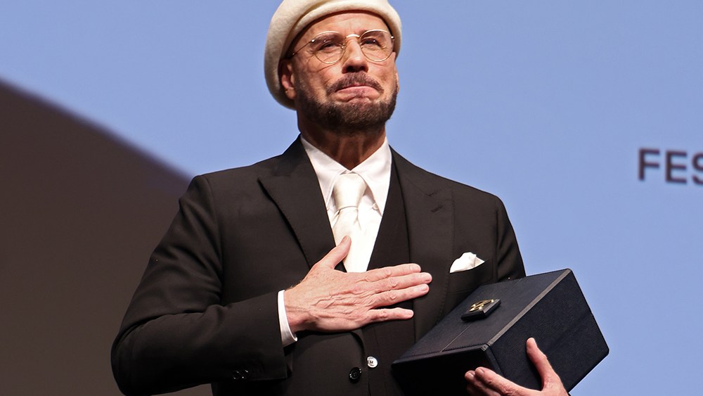 John Travolta Gets Cannes Award as ‘Grease’ Icon Gets Honorary Palme d’Or John Travolta Gets Cannes Award as 'Grease' Icon Gets Honorary Palme d'Or
