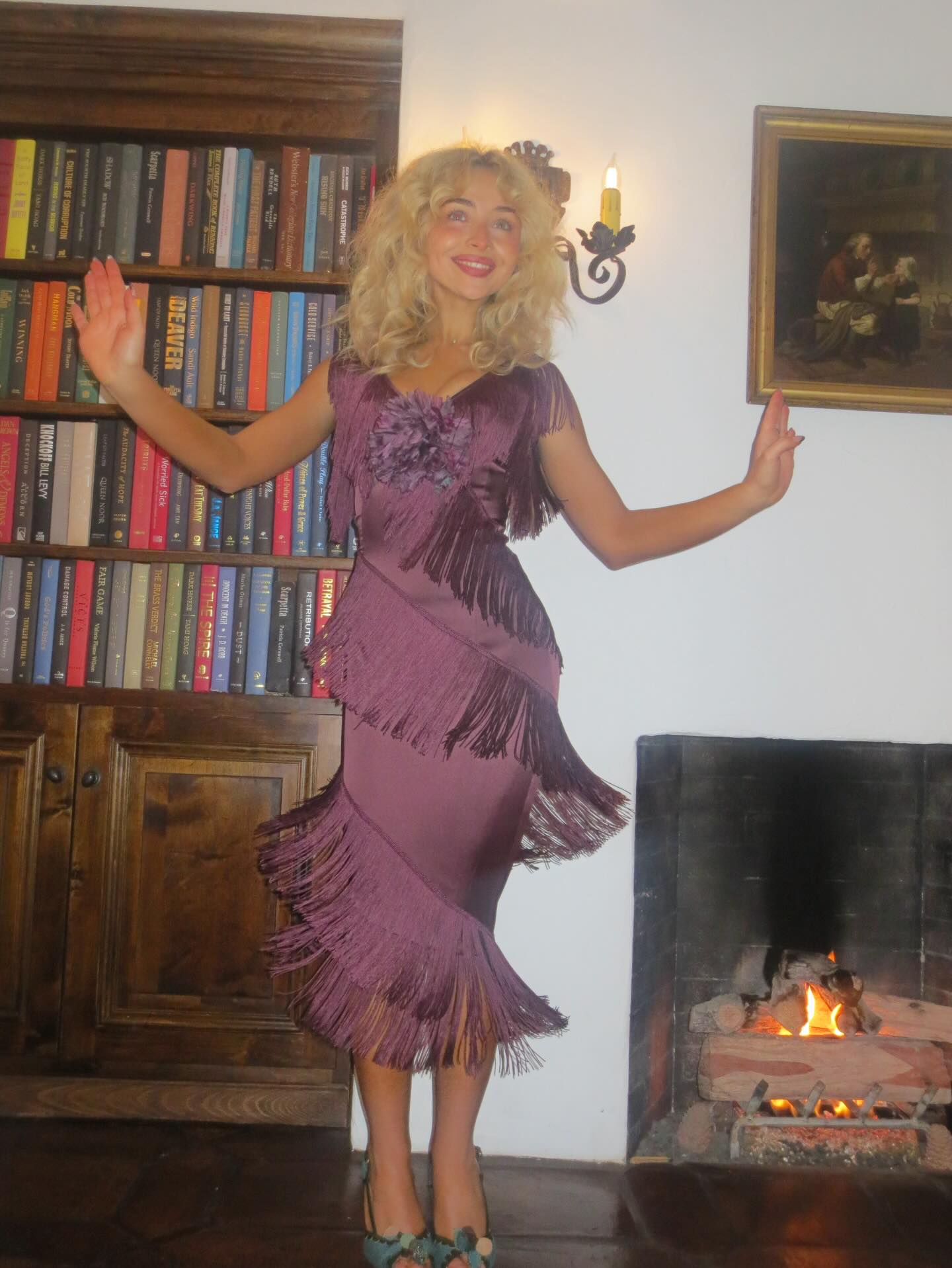 Sabrina Carpenter celebrates her birthday in a pretty purple fringe dress.