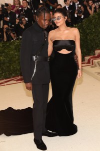 Travis Scott and Kylie Jenner (Photo by Amy Sussman/WWD/Penske Media via Getty Images)