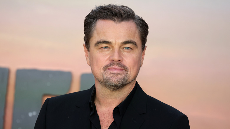 Leonardo DiCaprio in black with coiffed hair
