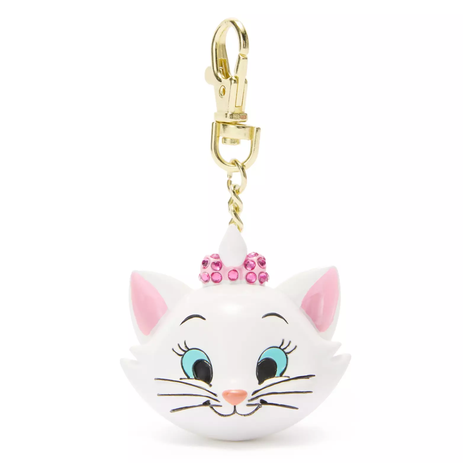 Marie's bag charm also shows her with a large smile. Her ears are 3D and come off of either side of her head. The tuft of hair on the top of her head (which is made of the same material as the rest of the charm) is "held together" with a pink bow covered in pink rhinestones.