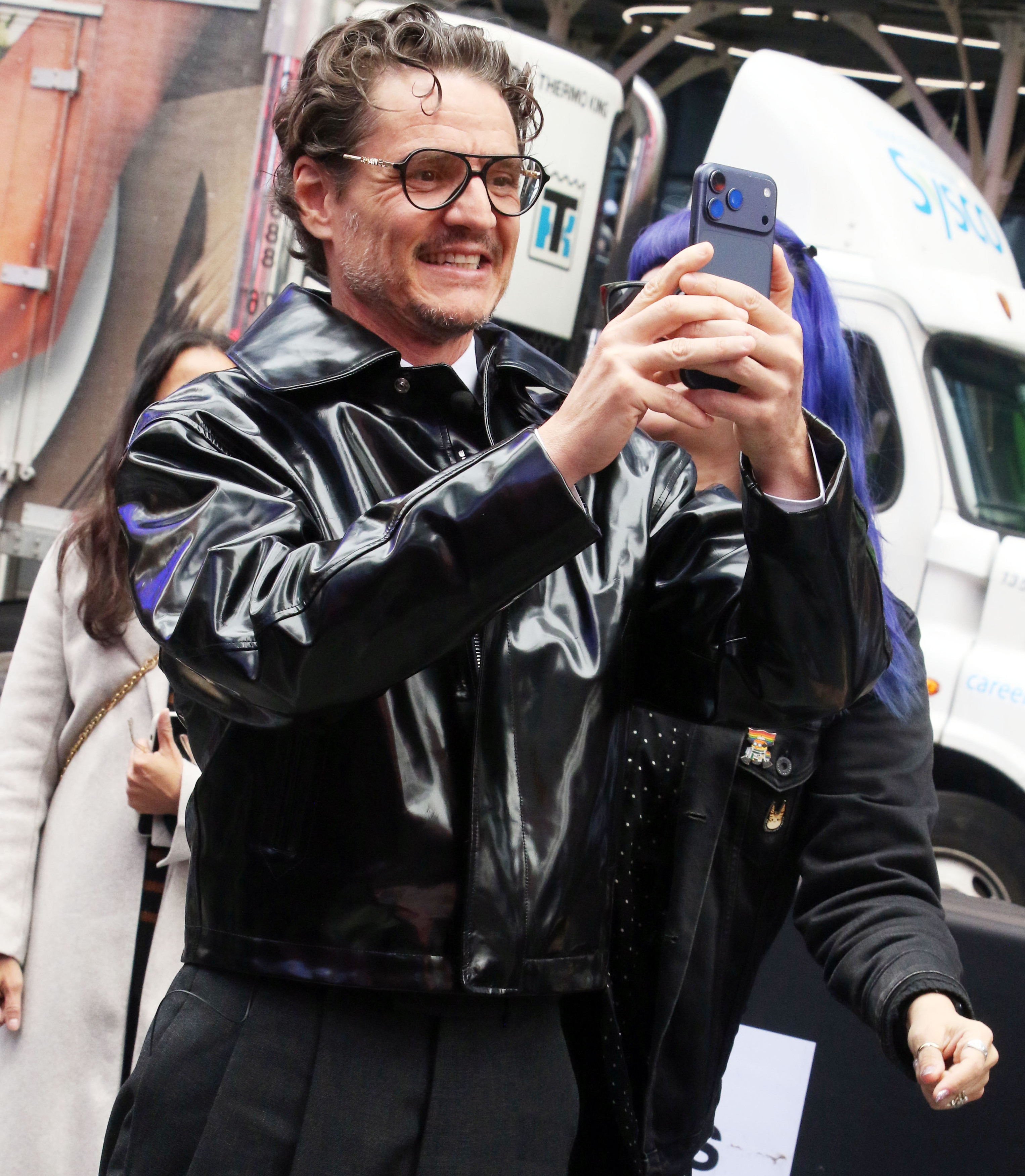 Pedro Pascal snaps some pics in Times Square, NYC.