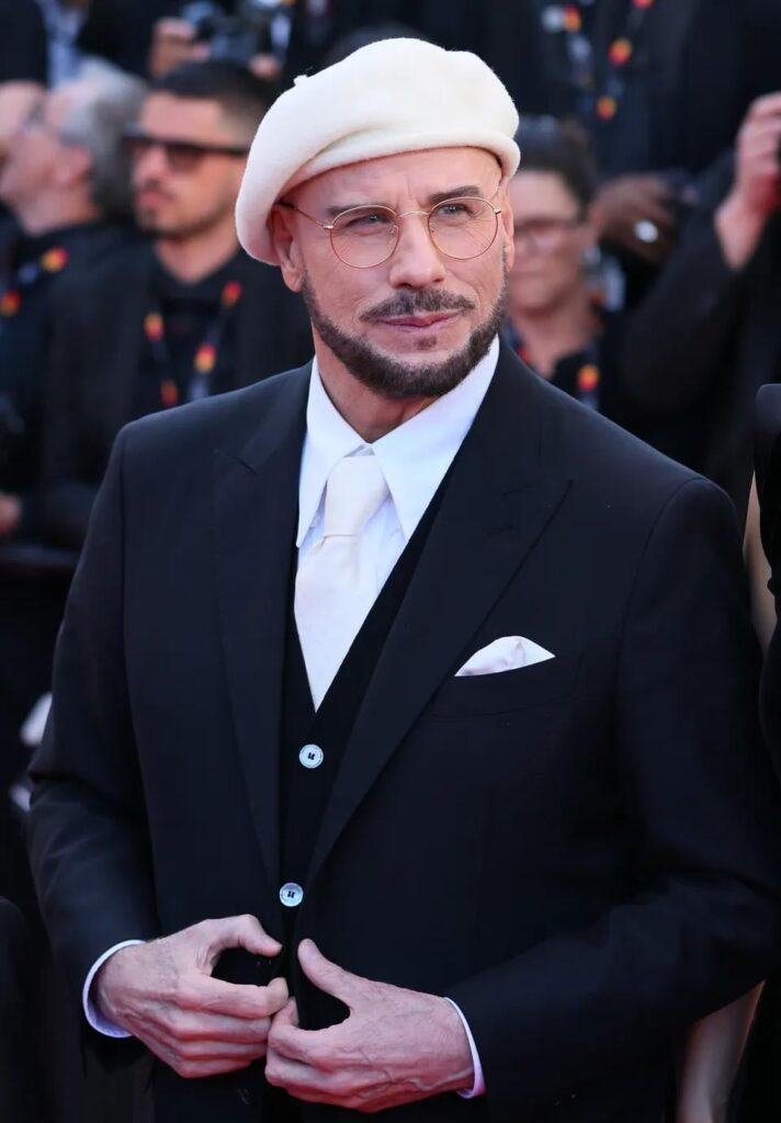 Every jaunty beret John Travolta has revealed during his film promo