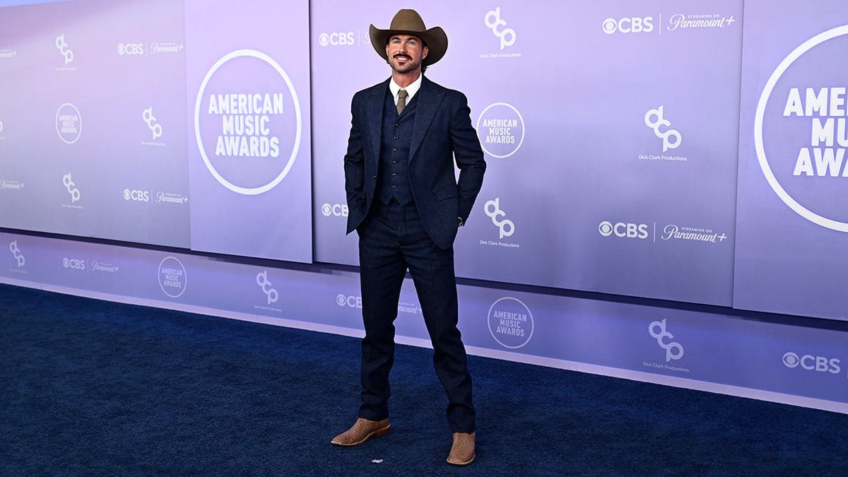 Riley Green standing at the 52nd American Music Awards in Las Vegas