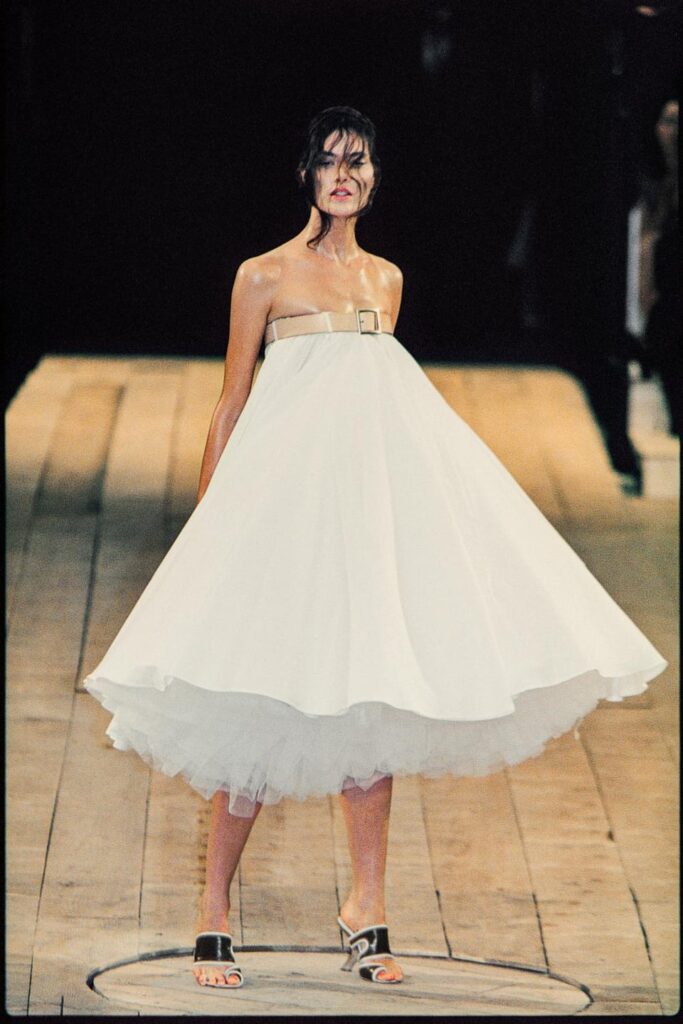 Alexander McQueen famous fashion finale, for his 1999 spring/summer show titled "Number 13." Featuring Shalom Harlow in the finale dress.