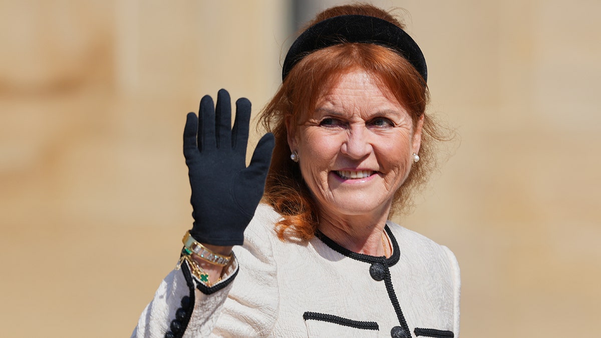 Sarah Ferguson waving while attending Easter Matins Service at St. George's Chapel Windsor Castle