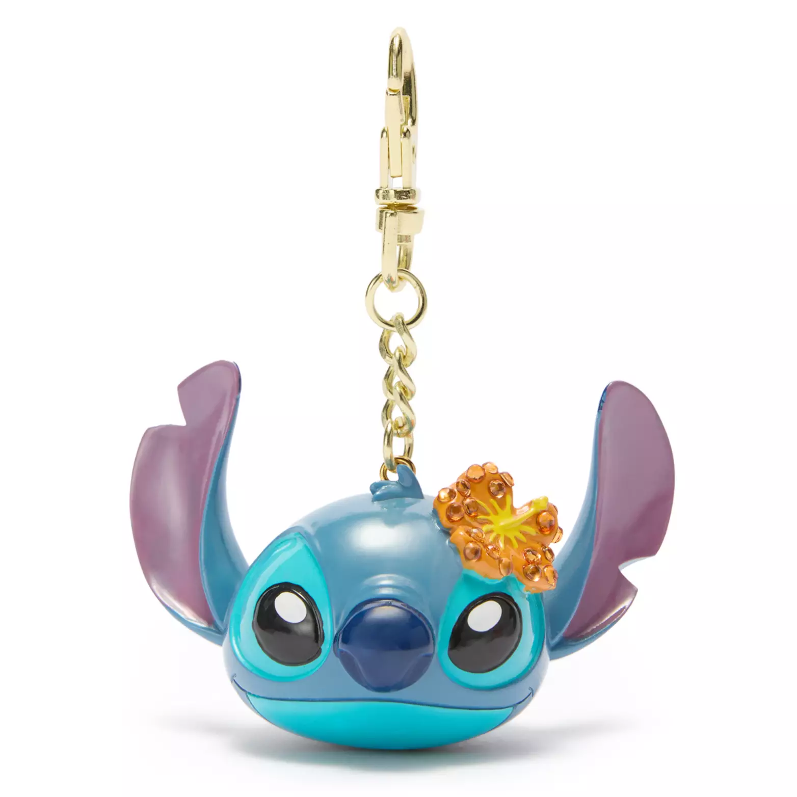 This figural Stitch head bag charm shows the blue alien smiling with his ears up. He also has an orange hibiscus flower bedazzled with orange rhinestones above his left ear.