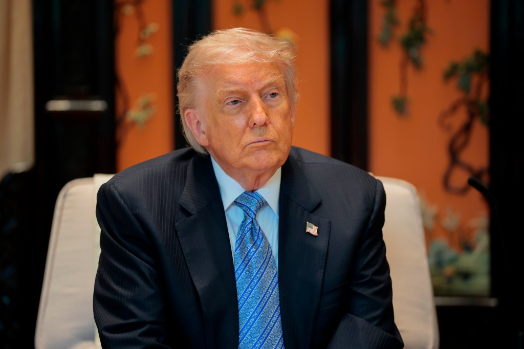 U.S. President Donald Trump looks on during a meeting with Chinese President Xi Jinping.