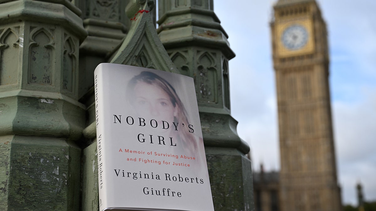 Virginia Roberts Giuffre's memoir Nobody's Girl displayed near Big Ben in London