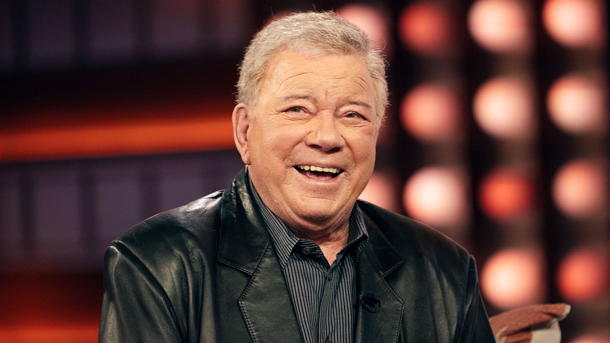 William Shatner standing on the set of The Kelly Clarkson Show.