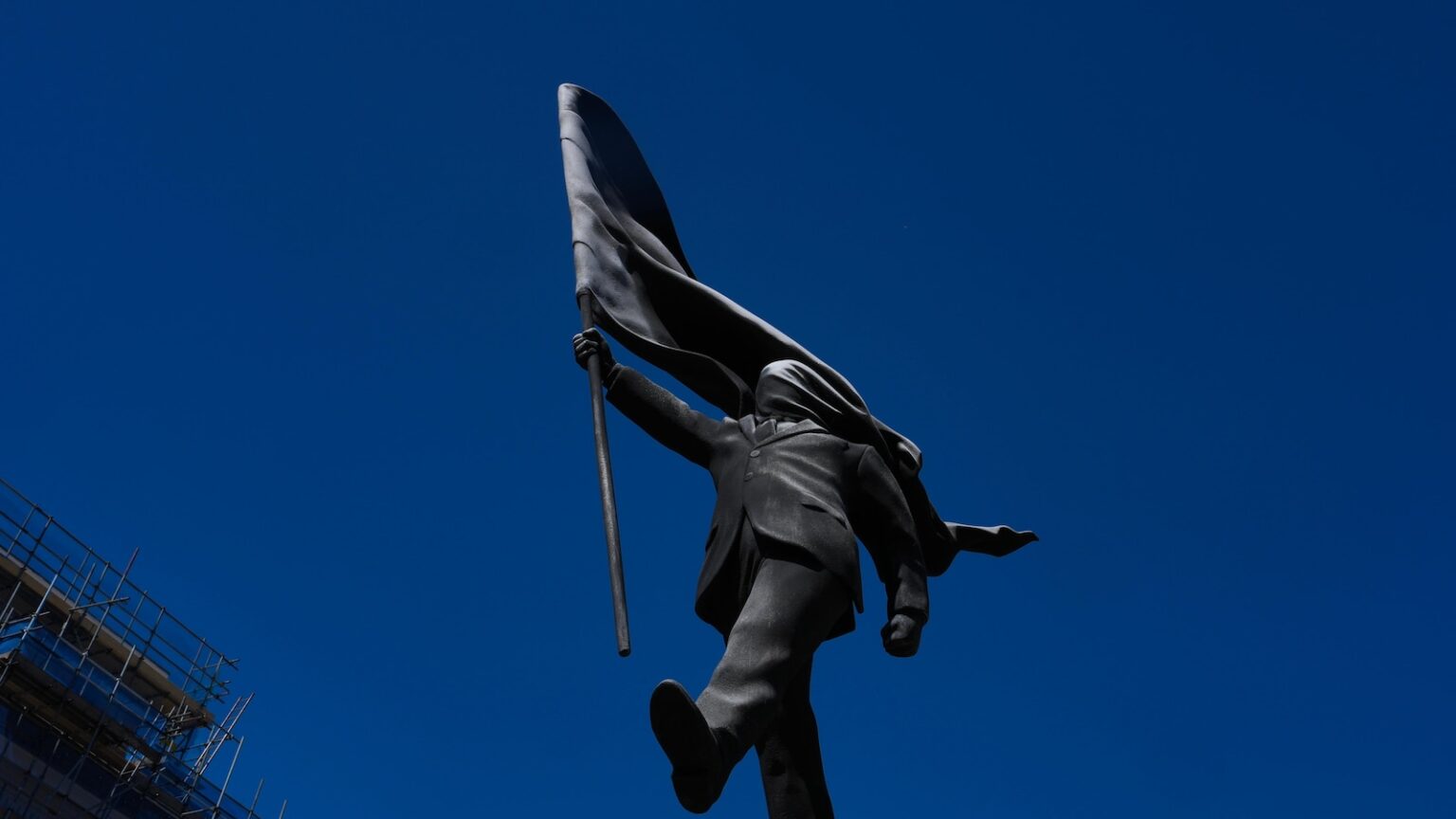 Banksy confirms a new statue in central London of a man blinded by a flag is his work