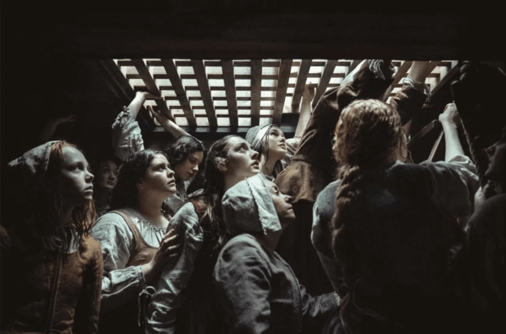 First Image from Historical-Folk-Horror ‘King’s Daughters’ from Director Pascal Plante (‘Red Rooms’) – Set in 1663, it follows the cursed transatlantic voyage of the first group of orphan virgins sent by King Louis XIV to be married off in his faltering colony of New-France, now known as Quebec. First Image from Historical-Folk-Horror 'King's Daughters' from Director Pascal Plante ('Red Rooms') - Set in 1663, it follows the cursed transatlantic voyage of the first group of orphan virgins sent by King Louis XIV to be married off in his faltering colony of New-France, now known as Quebec.