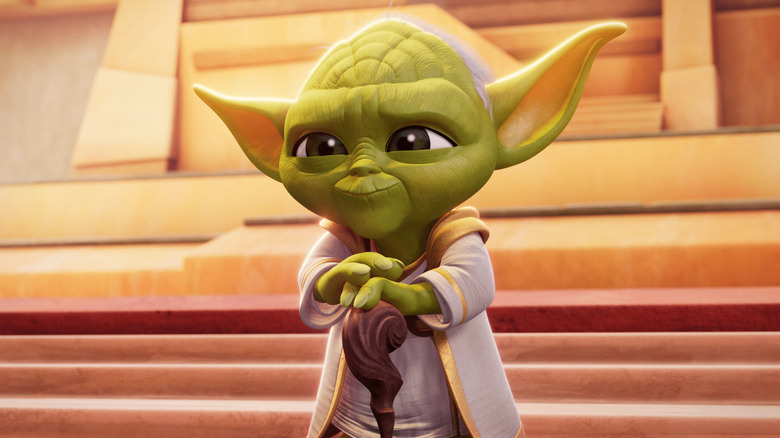 Yoda smiles on the steps of the temple in Young Jedi Adventures