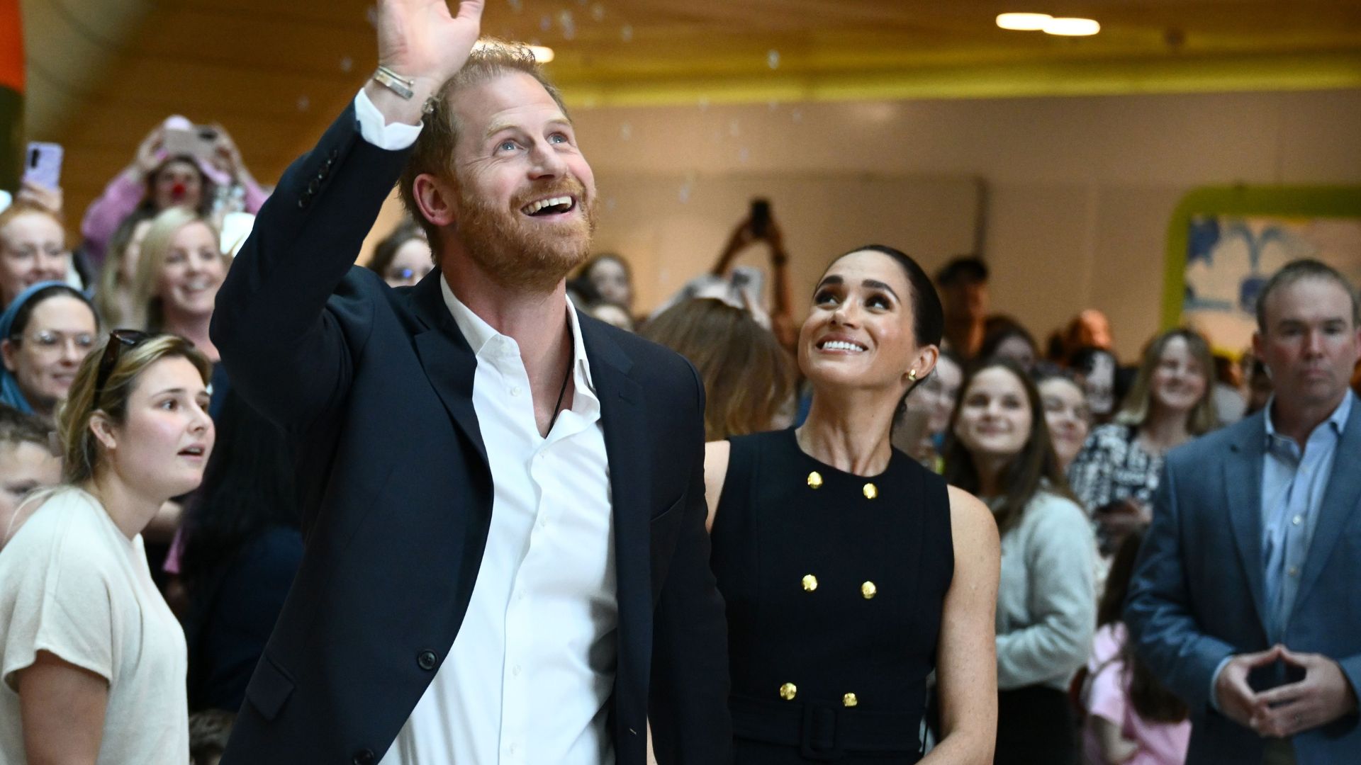 Prince Harry and Meghan Markle greet children during their visit to the Royal Children's Hospital in Melbourne, Australia, 14 April 2026