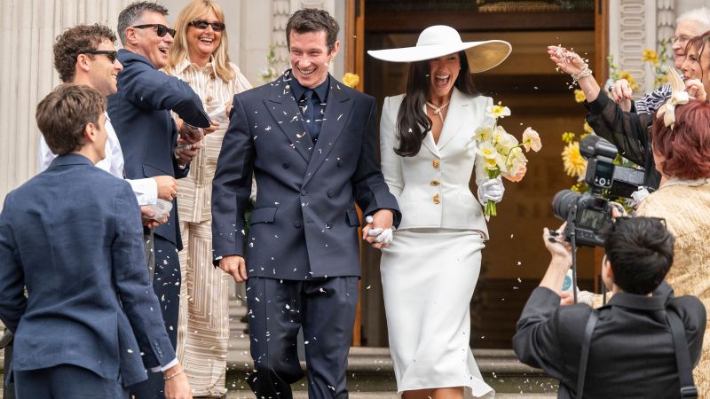 Dua Lipa marries Callum Turner in a Schiaparelli skirt suit Dua Lipa marries Callum Turner in a Schiaparelli skirt suit