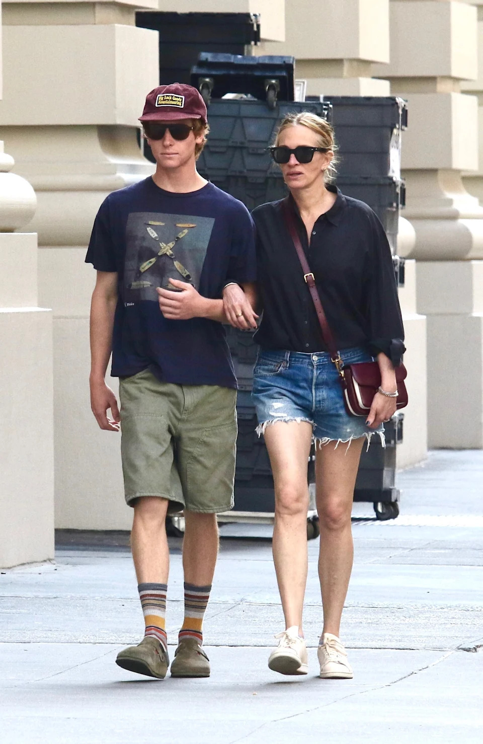 The young adult, who is now taller than his mom, walked with her arm linked in his throughout the Big Apple (as seen here). BrosNYC / BACKGRID