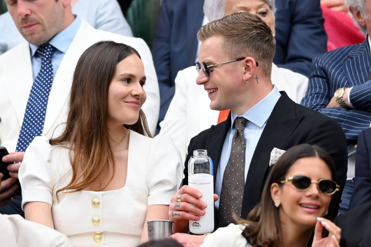 LONDON, ENGLAND - JULY 06: Holly Ramsay and Adam Peaty  attend day six of the Wimbledon Tennis Championships at the All England Lawn Tennis and Croquet Club on July 06, 2024 in London, England. (Photo by Karwai Tang/WireImage)