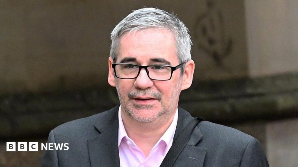 Former River City actor Iain Robertson found guilty of rape Iain Robertson wears a grey suit and pink shirt. he has short grey hair and wears dark glasses. He is walking outside a building