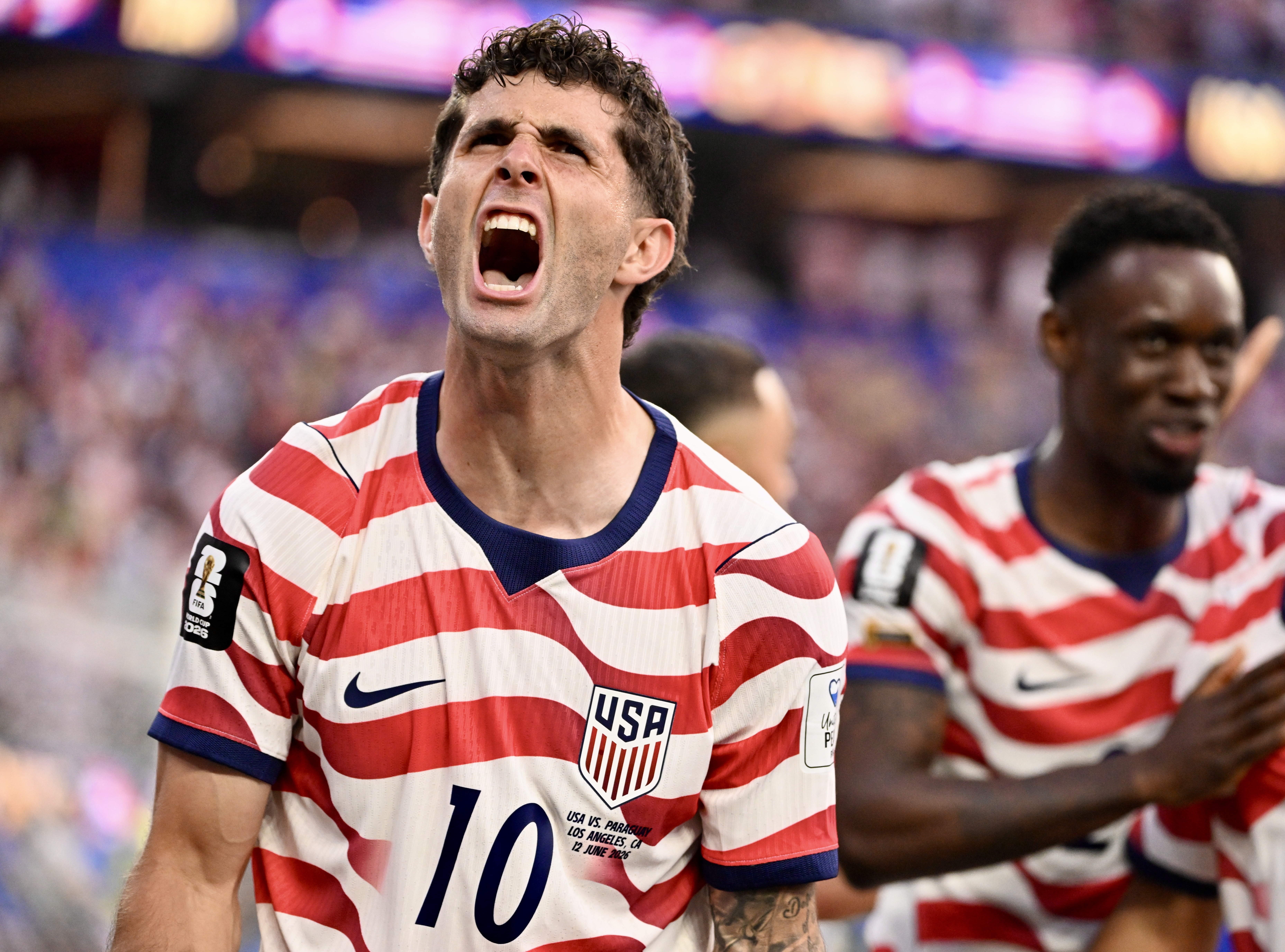United States midfielder Christian Pulisic (10) celebrates after a goal...