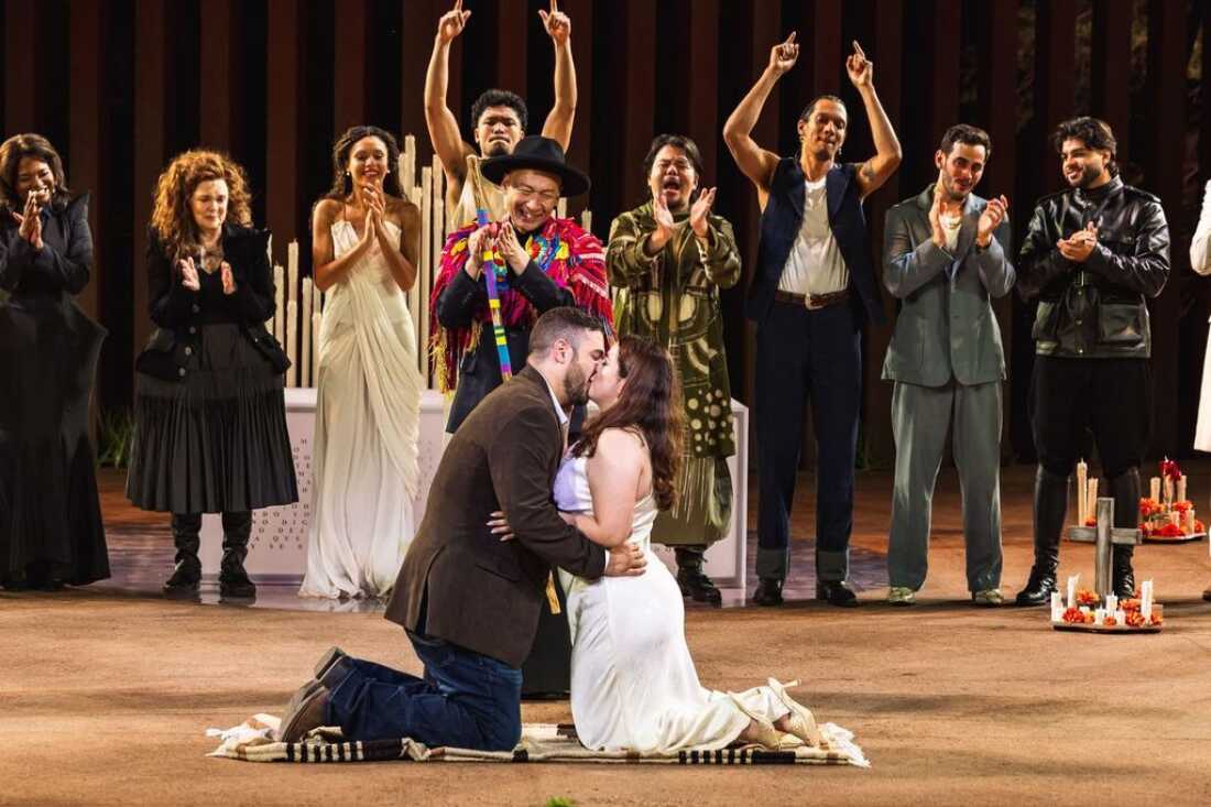 Oscar Diaz and Janelly Mendoza (kneeling), from Laredo, TX, were married on stage after a performance of Romeo and Juliet at the Public Theater's Delacorte Theater.